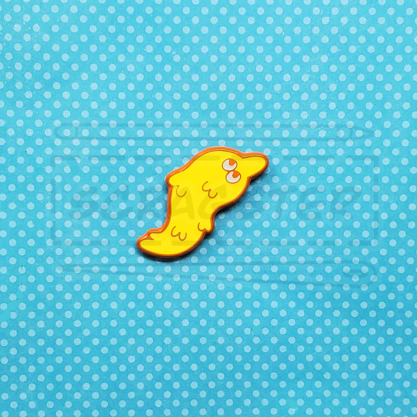 Worm on a String 1.5" Dyed Metal Enamel Pin